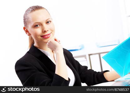 Business woman working on computer in office