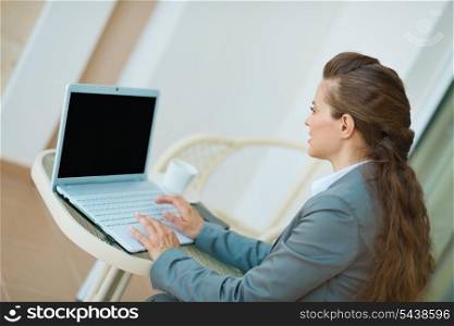 Business woman working on laptop