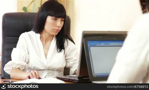 Business Woman Working On Laptop In Office