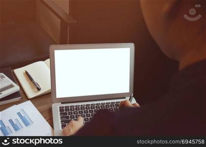 Business woman working on Laptop with Mock up blank screen. technology concept.
