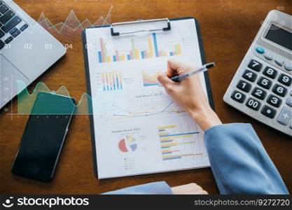 Business woman writing marketing note on paper charts graphs, Business financial and accounting concept, young female freelance financial working summary data outside at cafe coffee shop