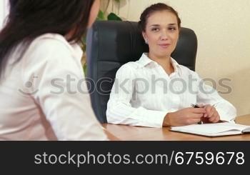 Business Women are Discussing In The Office