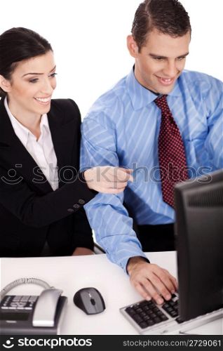 Business women pointing something on their computer over a white background