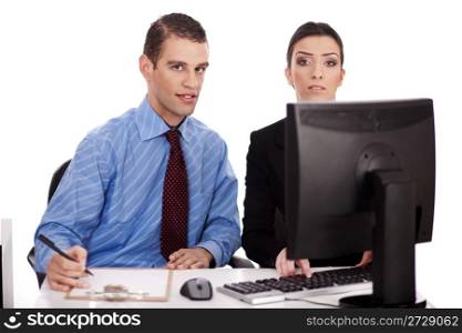 Business women pointing something on their computer over a white background