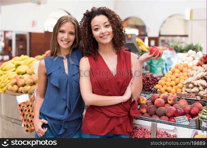 Business women presenting their organic greengrocer