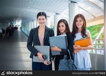 Business women standing and holding files, Business concept, Beauty Concept
