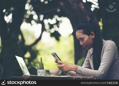 business women using smartphone for work