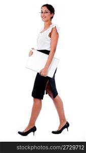 Business women walking with laptop on white background