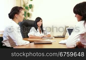 Business Women Working Together in a Meeting