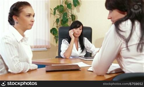 Business Women Working Together in Casual Meeting