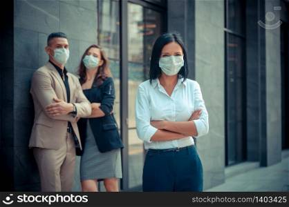 business worker wearing a protective mask in the city