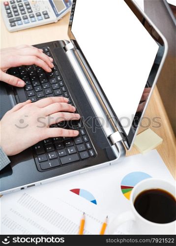 business workflow - office worker working with laptop with cut out screen at office table