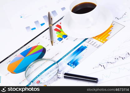 Business workplace. Close up image of office workplace with cup of coffee and documents