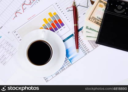 Business workplace. Close up image of office workplace with cup of coffee and documents