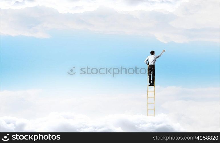 Businessma on ladder in sky. Businessman standing on ladder high in blue sky with clouds