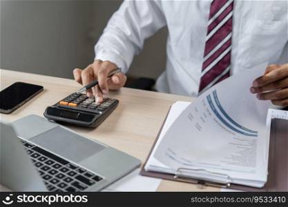 Businessman Accountant analyzing investment charts Invoice and pressing calculator buttons over documents. Accounting Bookkeeper Clerk Bank Advisor And Auditor Concept.