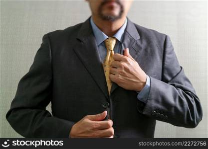 Businessman adjusting tie,Front view, no head. Concept of working in an office.