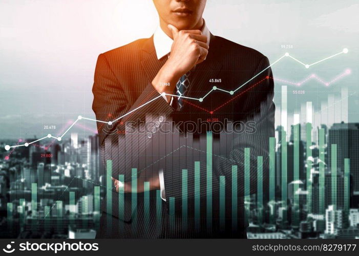 Businessman analyst working with digital finance business data graph showing technology of investment strategy for perceptive financial business decision. Digital economic analysis technology concept.. Businessman working with digital finance business graph of perceptive technology