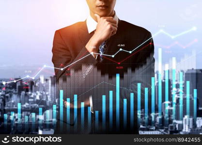 Businessman analyst working with digital finance business data graph showing technology of investment strategy for perceptive financial business decision. Digital economic analysis technology concept.. Businessman working with digital finance business graph of perceptive technology