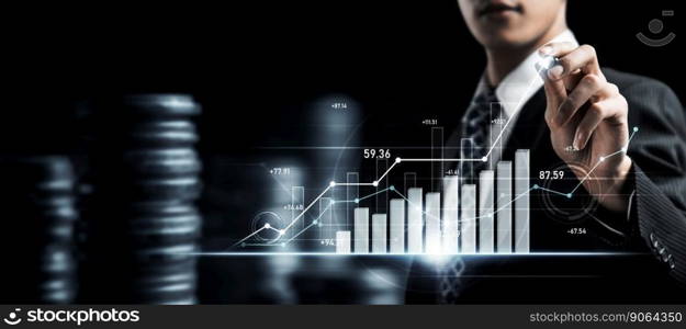 Businessman analyst working with digital finance business data graph showing technology of investment strategy for perceptive financial business decision. Digital economic analysis technology concept.. Businessman working with digital finance business graph of perceptive technology