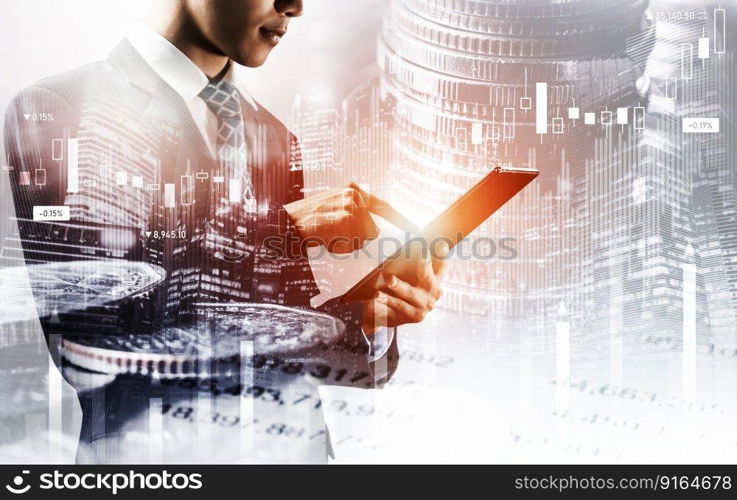 Businessman analyst working with digital finance business data graph showing technology of investment strategy for perceptive financial business decision. Digital economic analysis technology concept.. Businessman working with digital finance business graph of perceptive technology