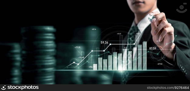 Businessman analyst working with digital finance business data graph showing technology of investment strategy for perceptive financial business decision. Digital economic analysis technology concept.. Businessman working with digital finance business graph of perceptive technology