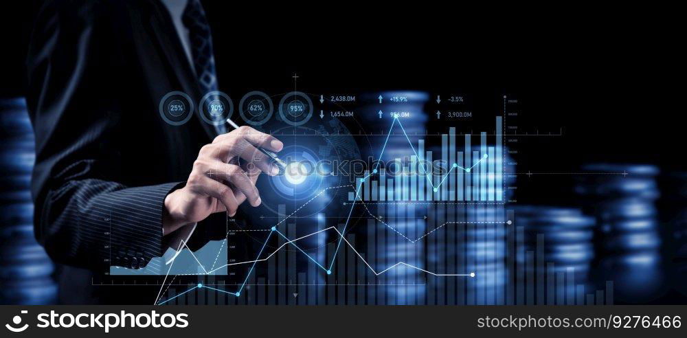 Businessman analyst working with digital finance business data graph showing technology of investment strategy for perceptive financial business decision. Digital economic analysis technology concept.. Businessman working with digital finance business graph of perceptive technology