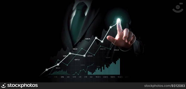 Businessman analyst working with digital finance business data graph showing technology of investment strategy for perceptive financial business decision. Digital economic analysis technology concept.. Businessman working with digital finance business graph of perceptive technology