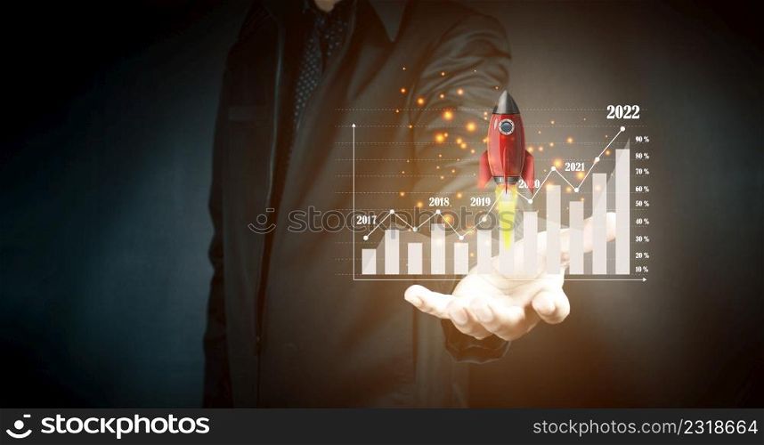 Businessman analyzing forex trading charts, financial data. Profitable investment ideas like rocket
