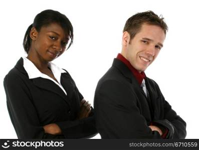 Businessman and a businesswoman standing with their arms crossed