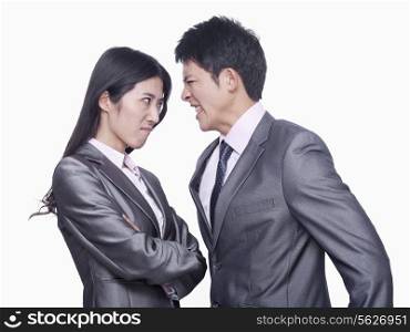 Businessman and businesswoman angry at each other