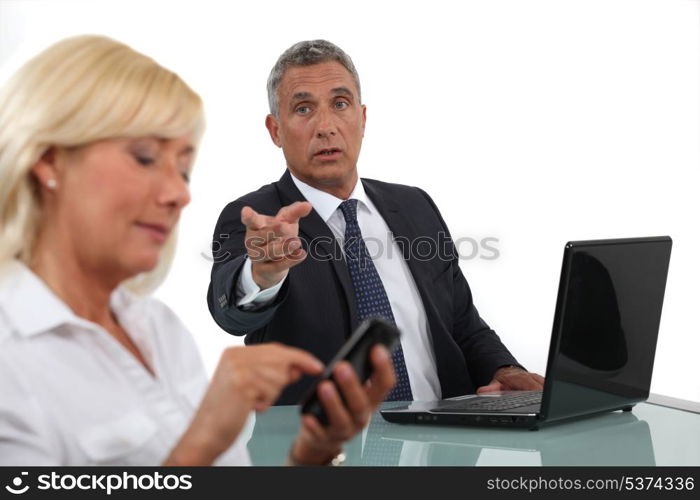 businessman and businesswoman having a discussion