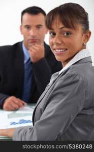 businessman and businesswoman having a discussion