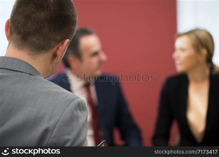 Businessman And Businesswoman In Mediation Meeting