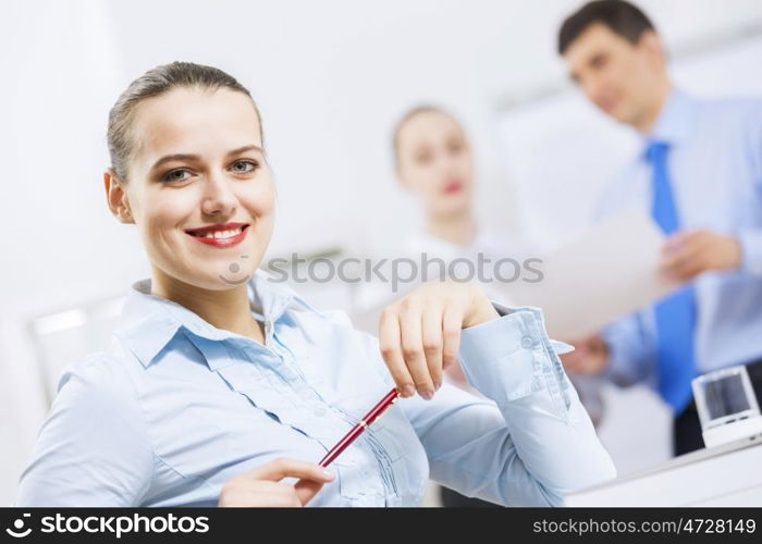 Businessman and businesswoman in office having conversation. Working in partnership