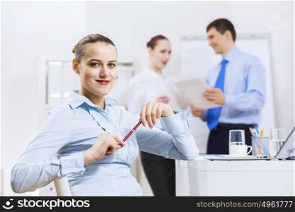 Businessman and businesswoman in office having conversation. Working in partnership