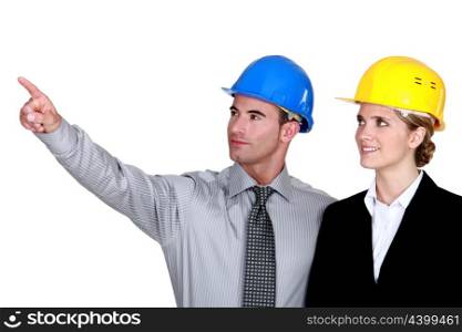 businessman and businesswoman on site