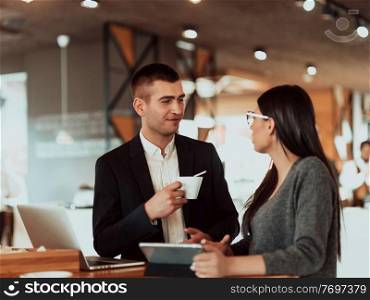 businessman and businesswoman use modern devices, laptop, tablet, and smartphone and arrange new projects for the job. Business concept . businessman and businesswoman use modern devices, laptop, tablet and smartphone and arrange new projects for the job. 