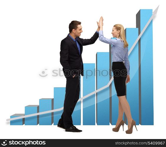 businessman and businesswoman with 3d graphics giving high five