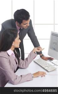 Businessman and businesswoman working together