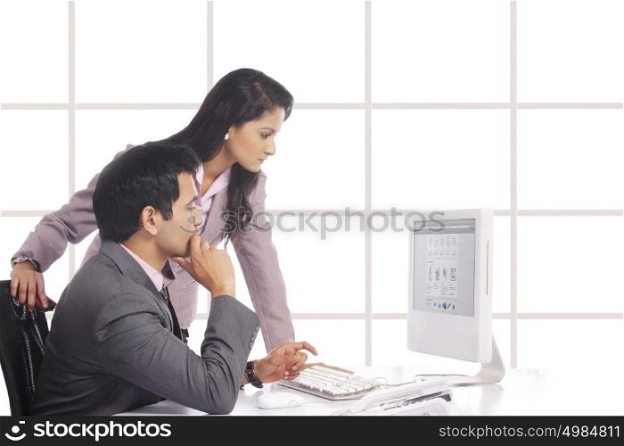 Businessman and businesswoman working together