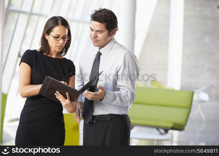 Businessman And Businesswomen Having Meeting In Office