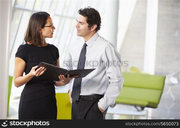 Businessman And Businesswomen Having Meeting In Office