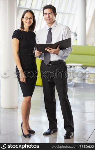 Businessman And Businesswomen Having Meeting In Office