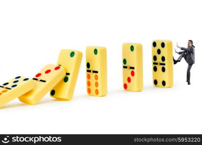 Businessman and dominoes isolated on the white