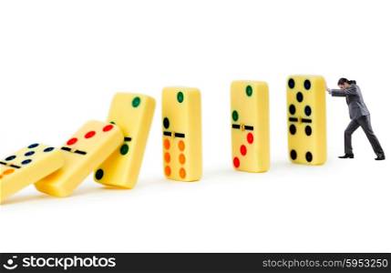 Businessman and dominoes isolated on the white