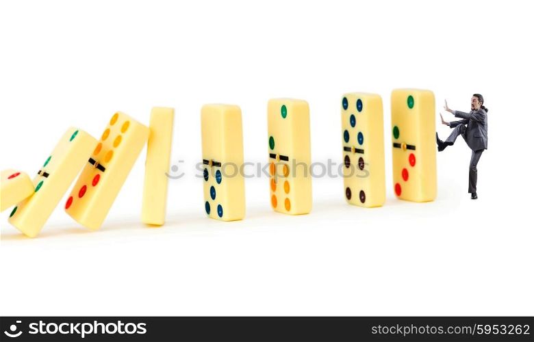 Businessman and dominoes isolated on the white