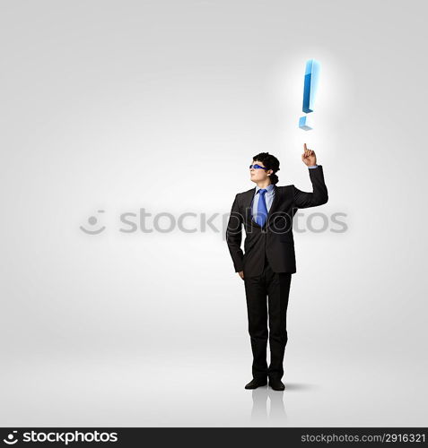 Businessman and exclamation mark