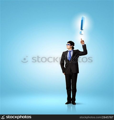Businessman and exclamation mark
