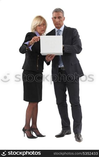 businessman and lady with laptop